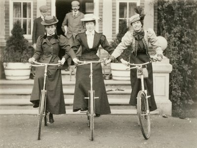 Three women on bicycles, early 1900s by English Photographer